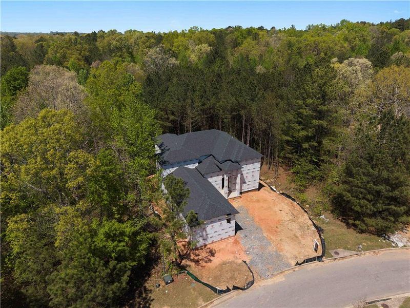 Front exterior of a new home in , Fairburn, GA, highlighting curb appeal (Image 9).