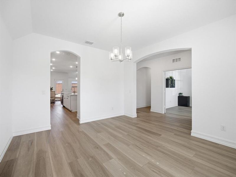 Formal Dining room view of single story three bedroom home with an office and a formal dining room