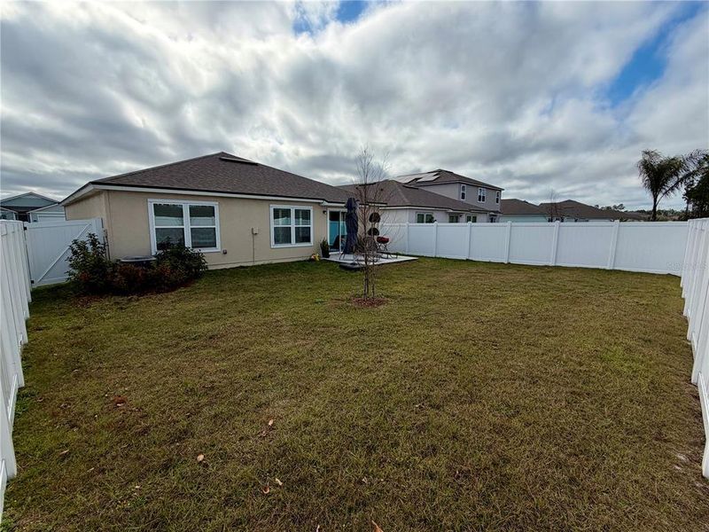 Exterior details and patio area of a home in Sawmill Branch Express, Palm Coast (Image 25).