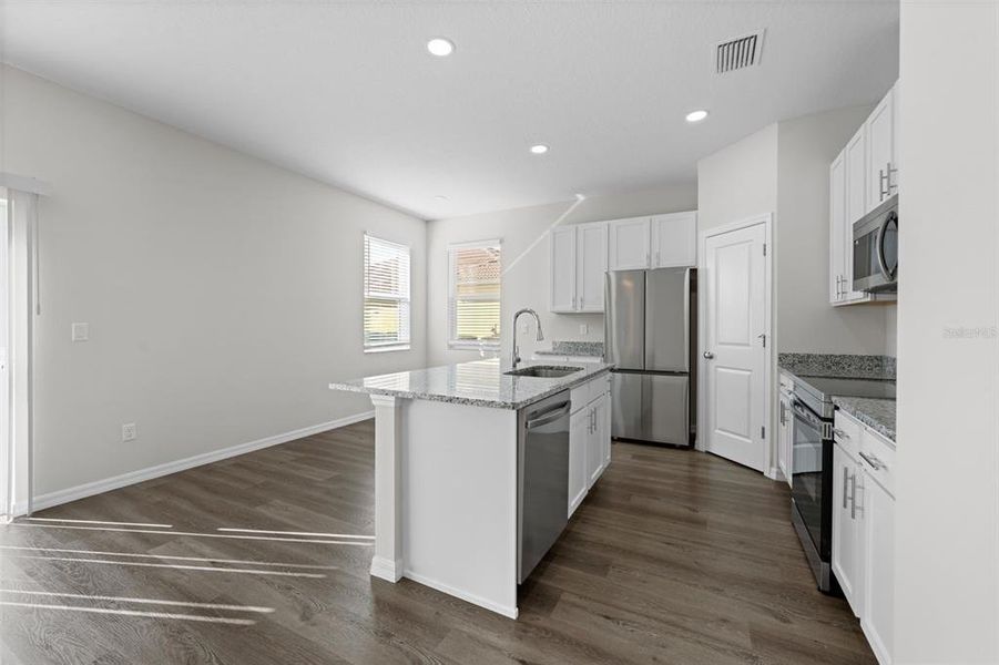 Furnished interior view inside a new home in , Weeki Wachee (Image 9).