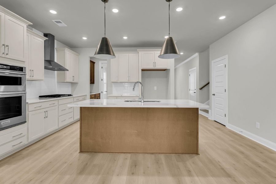Furnished interior view inside a new home in Tidewater at Lakes of Cane Bay, Summerville (Image 4).