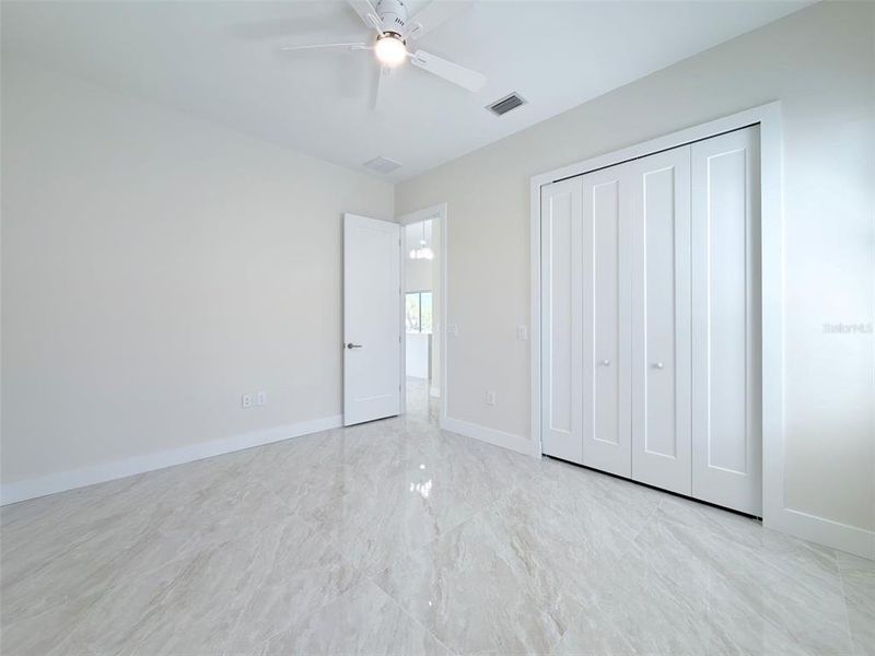 Spacious, unfurnished interior of a new home in , Port Charlotte (Image 33).