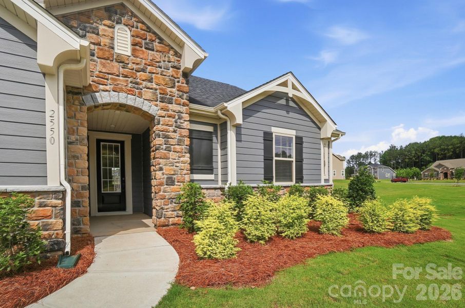 Exterior details and patio area of a home in Blair Place, Monroe (Image 4).