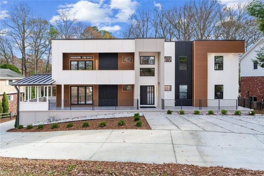 Front exterior of a new home in , Brookhaven, GA, highlighting curb appeal (Image 1). Front exterior of a new home in , Brookhaven, GA, highlighting curb appeal (Image 1).