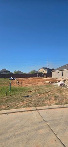 Front exterior of a new home in Sunterra, Katy, TX, highlighting curb appeal (Image 54). Front exterior of a new home in Sunterra, Katy, TX, highlighting curb appeal (Image 54).
