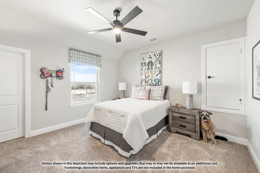 Bedroom with vaulted ceiling, ceiling fan, carpet flooring, and a window with natural light Bedroom with vaulted ceiling, ceiling fan, carpet flooring, and a window with natural light