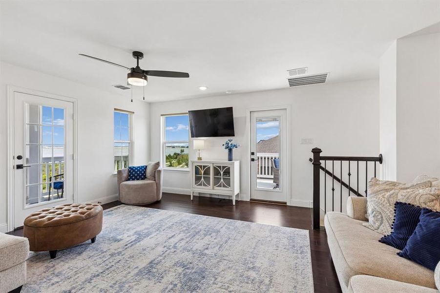 Step outside to the private balcony and enjoy elevated views of Lake Ray Hubbard, creating a unique extension of the indoor living space.