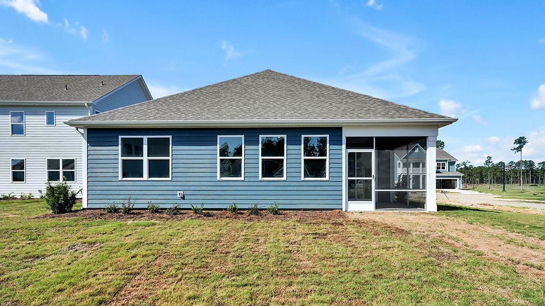 Exterior details and patio area of a home in The Haven at Indigo Preserve, Leland (Image 3).