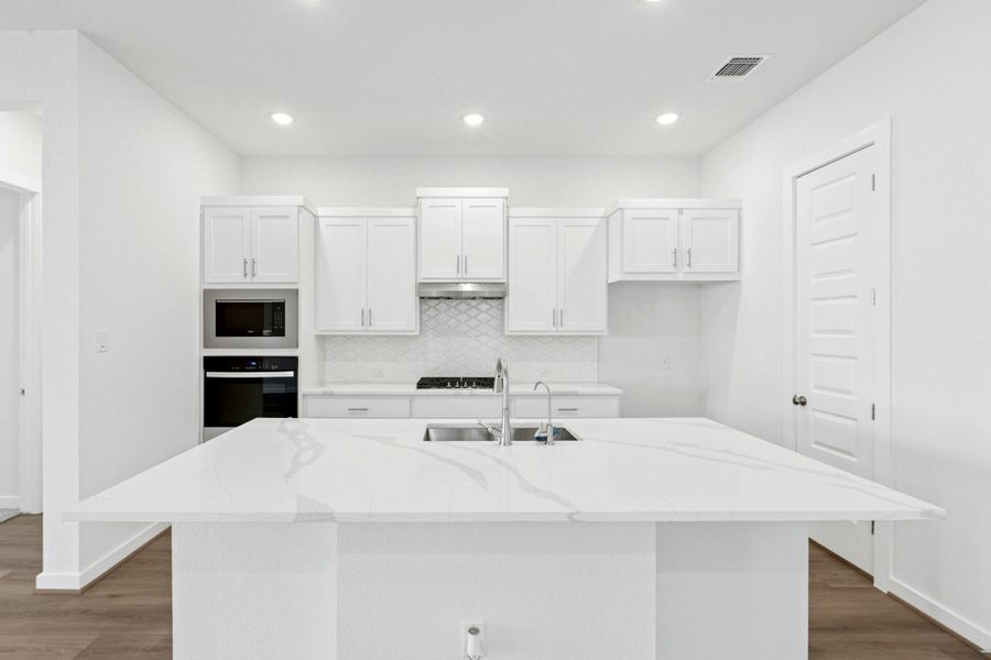 Furnished interior view inside a new home in University Heights, Round Rock (Image 6).