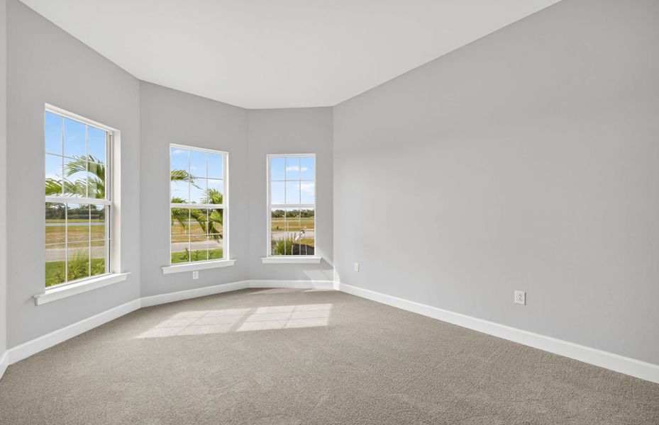 Spacious, unfurnished interior of a new home in Del Webb Oak Creek, North Fort Myers (Image 22).