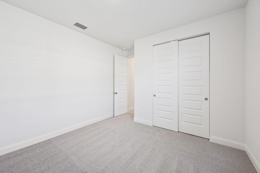 Spacious, unfurnished interior of a new home in Brystol at Wylder - Reserve Series, Port St. Lucie (Image 10).