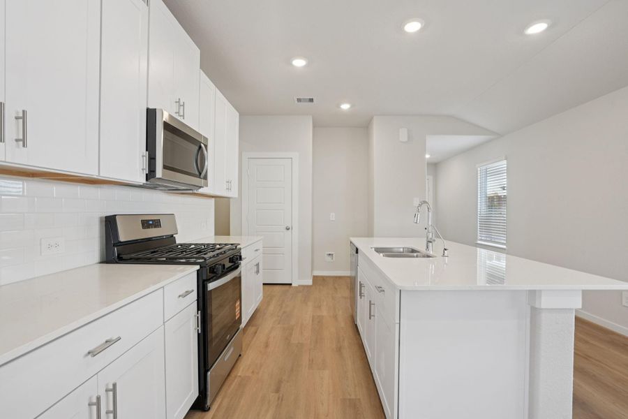 Furnished interior view inside a new home in Pine Lake Cove - Traditional Series, Montgomery (Image 10).