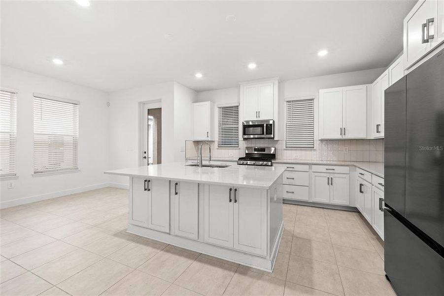 Furnished interior view inside a new home in Harvest At Ovation 50s, Winter Garden (Image 12).
