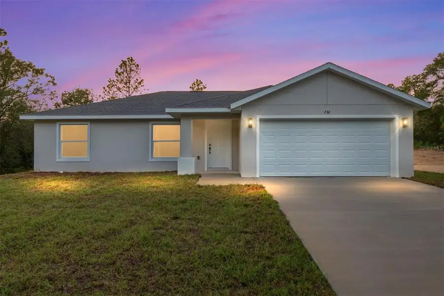 Front exterior of a new home in , Dunnellon, FL, highlighting curb appeal (Image 2). Front exterior of a new home in , Dunnellon, FL, highlighting curb appeal (Image 2).
