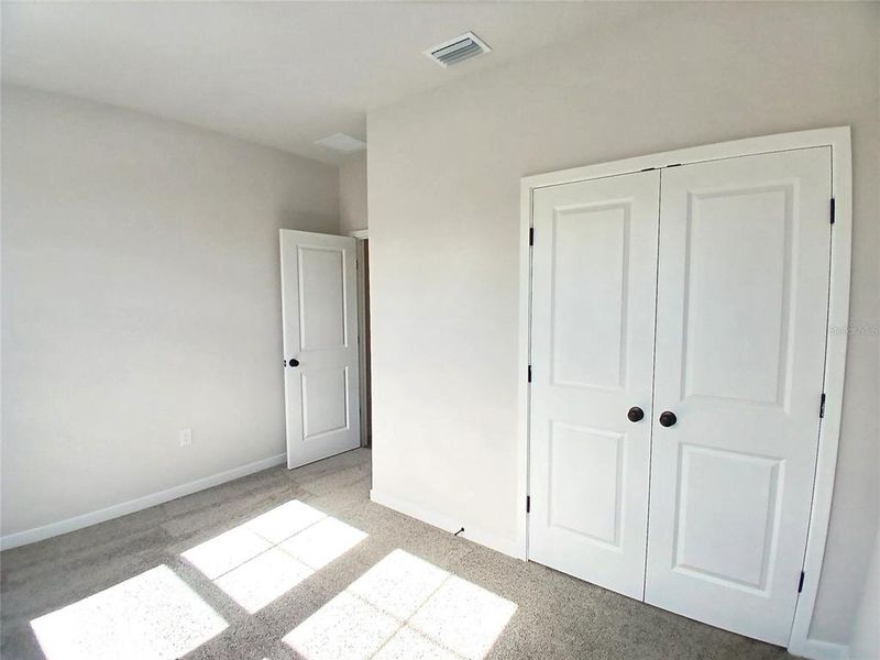 Spacious, unfurnished interior of a new home in Magnolia Series at Seminole Palms, Palm Coast (Image 11).