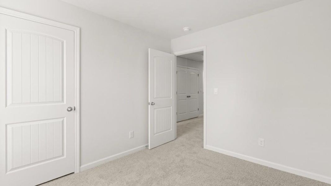 Spacious, unfurnished interior of a new home in Carlton, Douglasville (Image 22).