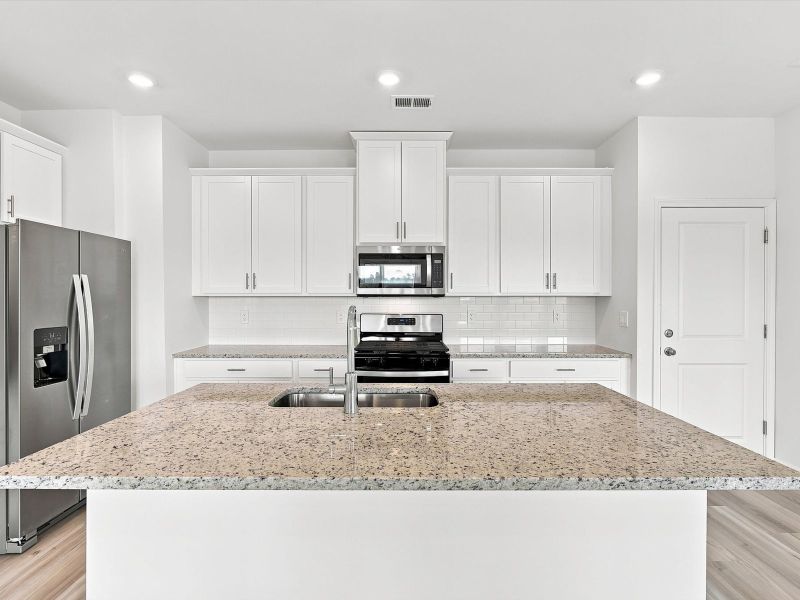 Furnished interior view inside a new home in Waterside - Boardwalk Series, Longs (Image 5).