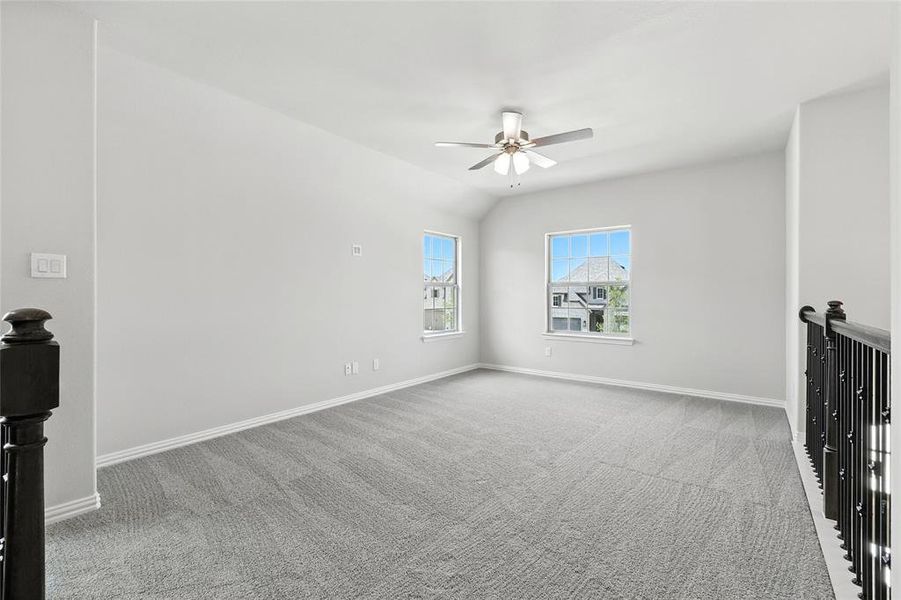 Unfurnished room with ceiling fan and carpet floors Unfurnished room with ceiling fan and carpet floors