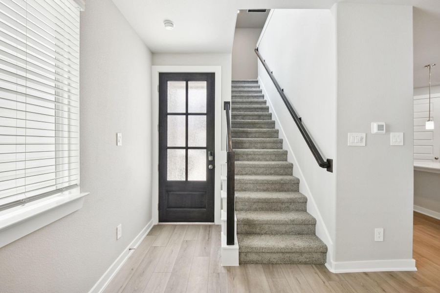 Photos are not of the actual home, but are photos of the builder home with same floorplan with similar interior finishes.