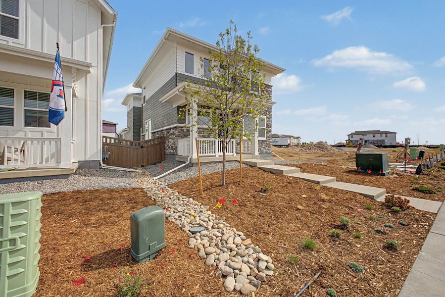 Exterior details and patio area of a home in Painted Prairie, Aurora (Image 3).