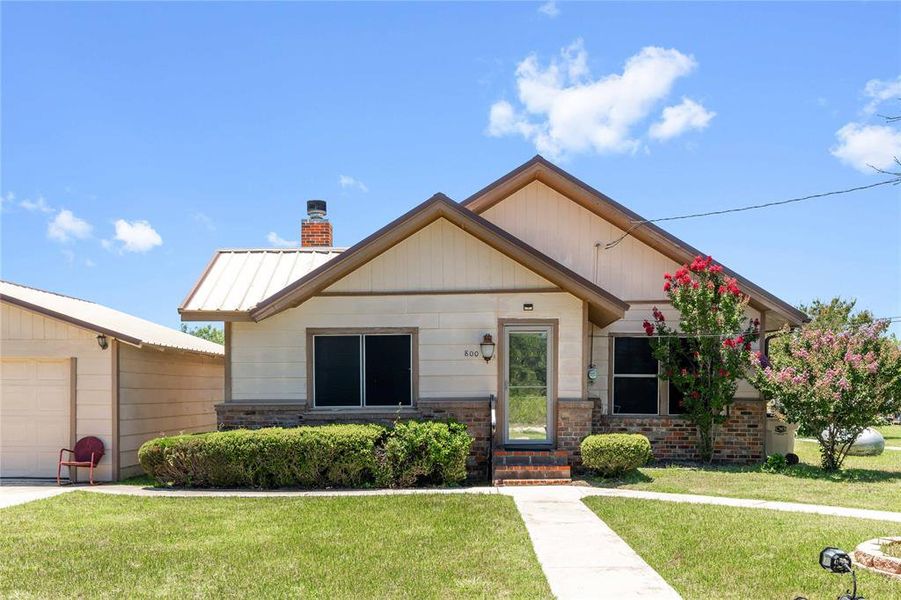 Front exterior of a new home in , Brownwood, TX, highlighting curb appeal (Image 20).