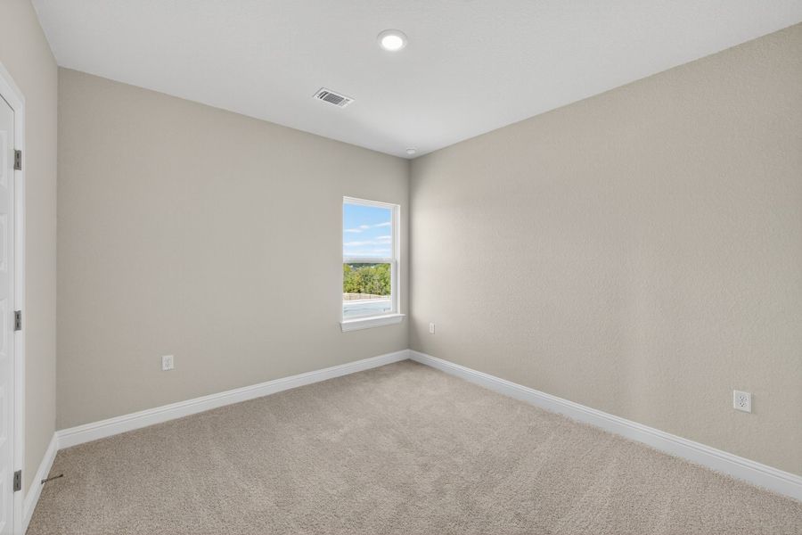 Spacious, unfurnished interior of a new home in Whisper Valley, Manor (Image 29).