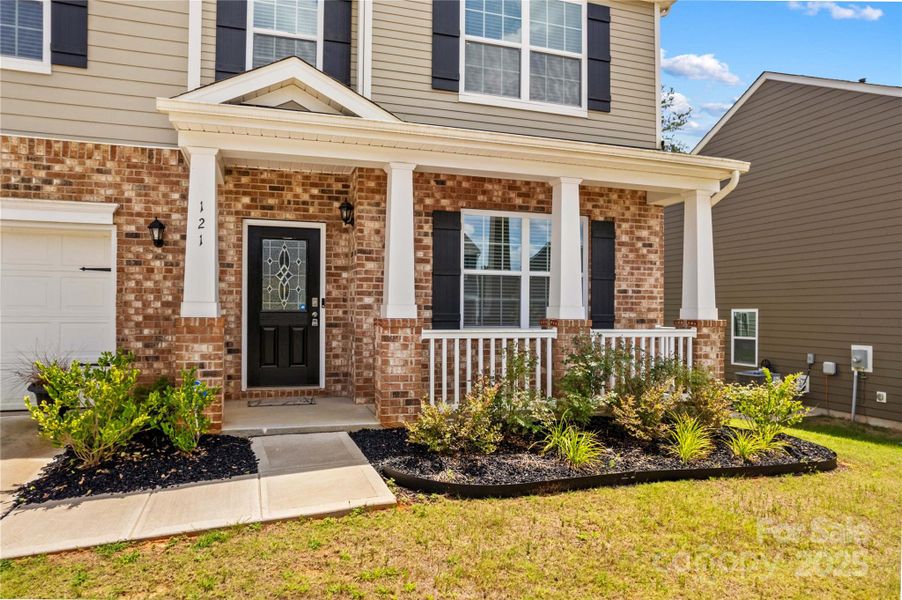 Front exterior of a new home in Calvin Creek, Troutman, NC, highlighting curb appeal (Image 2).