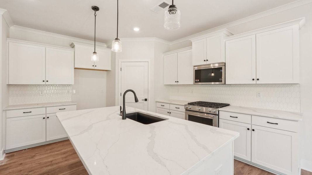 Representative furnished interior of a home built from the Magnolia by D.R. Horton in Westport, York (Image 6).