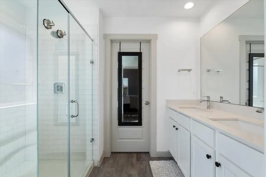 Primary bathroom with walk-in closet Primary bathroom with walk-in closet