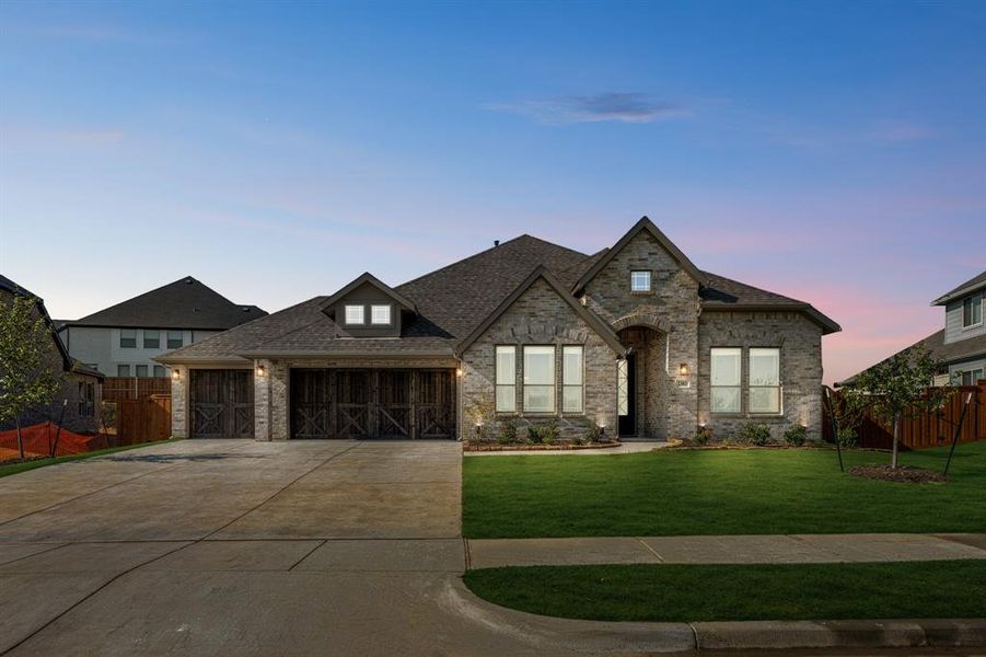 Front exterior of a new home in Rockwood 90, Mansfield, TX, highlighting curb appeal (Image 25). Front exterior of a new home in Rockwood 90, Mansfield, TX, highlighting curb appeal (Image 25).