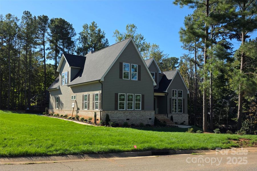 Front exterior of a new home in , Denver, NC, highlighting curb appeal (Image 1). Front exterior of a new home in , Denver, NC, highlighting curb appeal (Image 1).