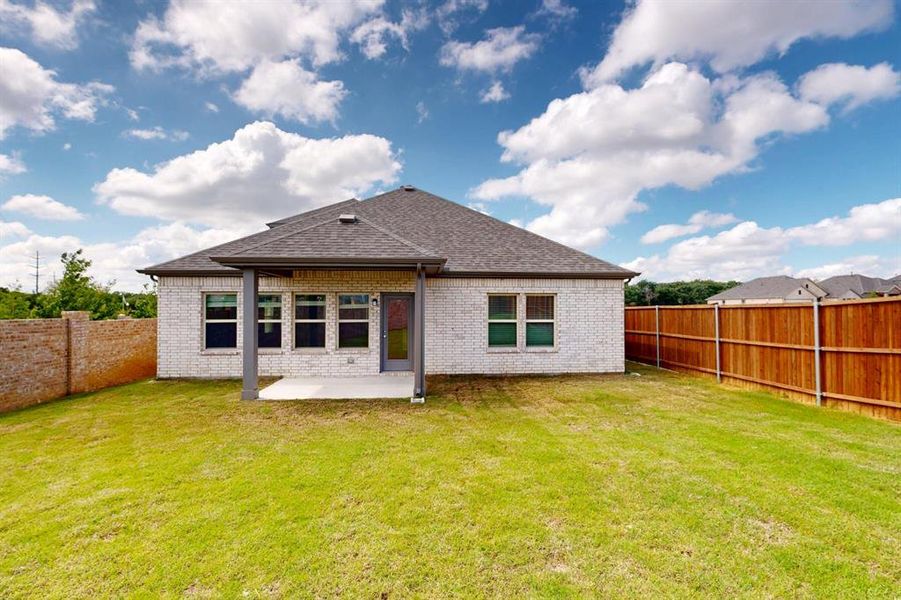Front exterior of a new home in Kings Way, Denton, TX, highlighting curb appeal (Image 1). Front exterior of a new home in Kings Way, Denton, TX, highlighting curb appeal (Image 1).