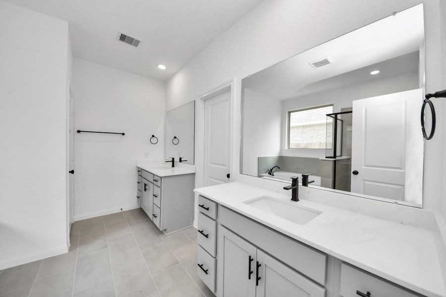 Furnished interior view inside a new home in 45' Traditional Homes at Elyson, Katy (Image 8).