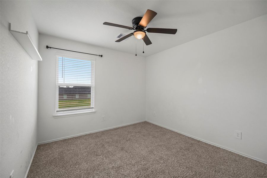 Versatile secondary upstairs bedroom for family, guests, or a home office Versatile secondary upstairs bedroom for family, guests, or a home office