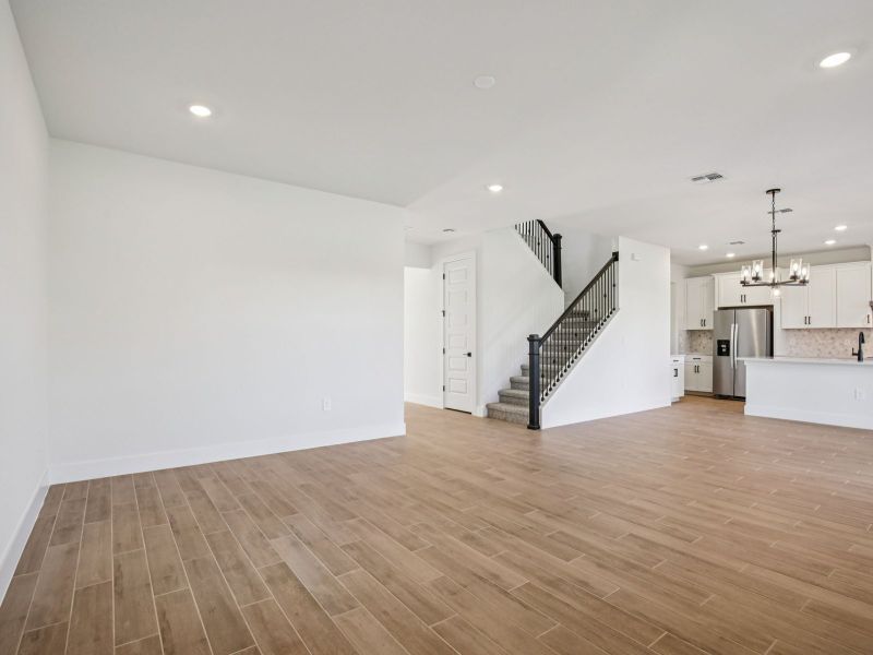 Spacious, unfurnished interior of a new home in Magnolia Bay - Reserve Series, Nokomis (Image 12).