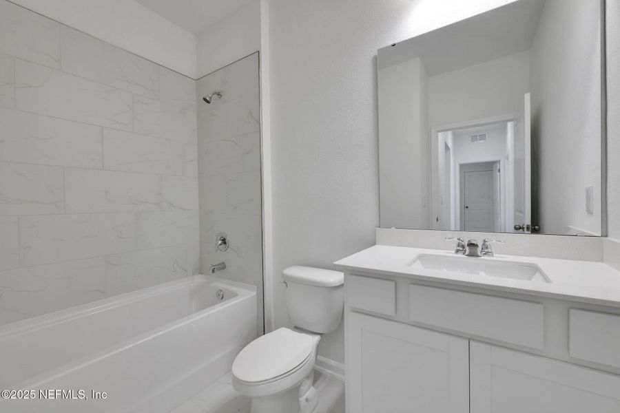 Furnished interior view inside a new home in Cordova Palms, St. Augustine (Image 7).