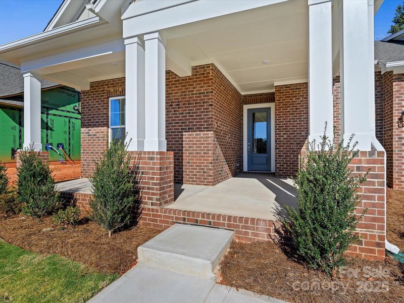 Exterior details and patio area of a home in Whitley Preserve – Enclave Collection, Mint Hill (Image 4).