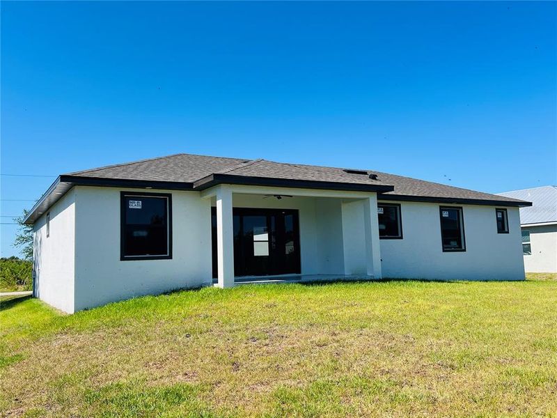 Exterior details and patio area of a home in , Port Charlotte (Image 38).