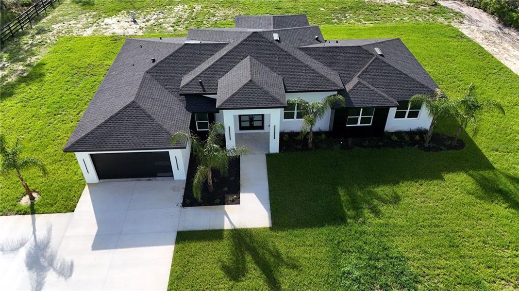 Front exterior of a new home in , Eustis, FL, highlighting curb appeal (Image 21).