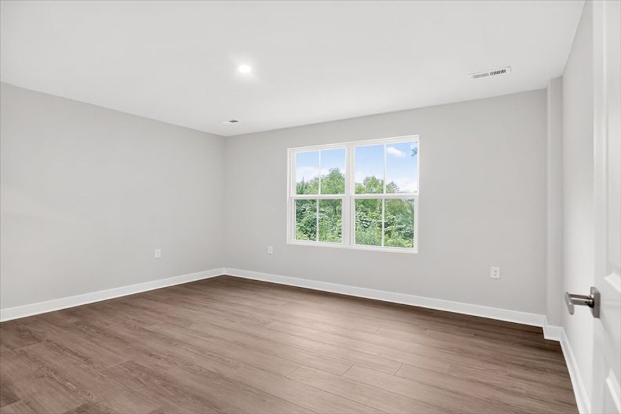 Spacious, unfurnished interior of a new home in Arden Woods, Greenville (Image 13).