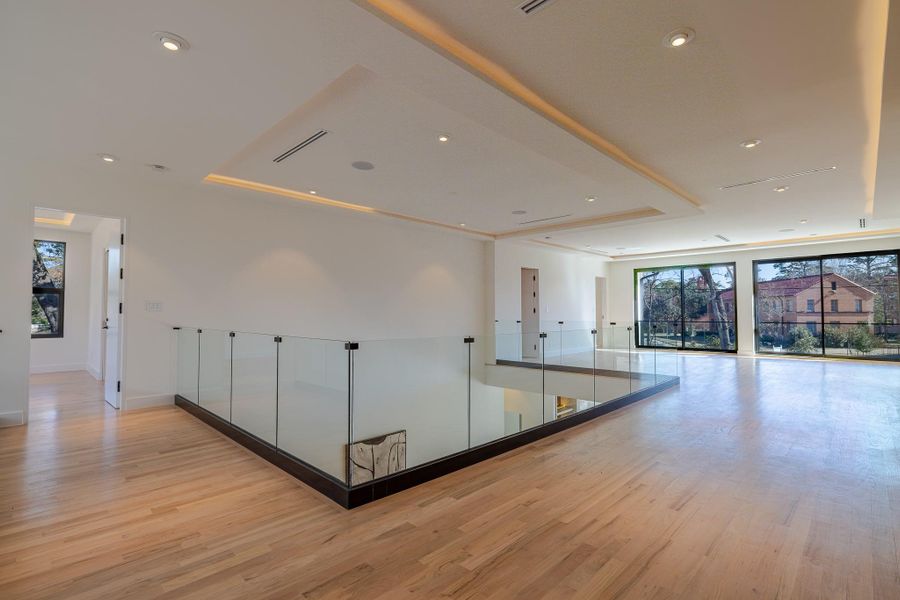 Upstairs loft area overlooking main level. Upstairs loft area overlooking main level.