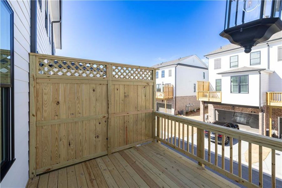 Exterior details and patio area of a home in Millcroft Townhomes, Buford (Image 1). Exterior details and patio area of a home in Millcroft Townhomes, Buford (Image 1).
