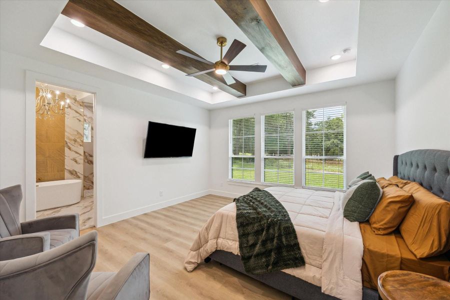 Primary Bedroom just before walking into bathroom retreat. Primary Bedroom just before walking into bathroom retreat.