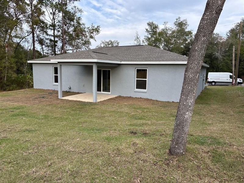 Exterior details and patio area of a home in , Citrus Springs (Image 20).