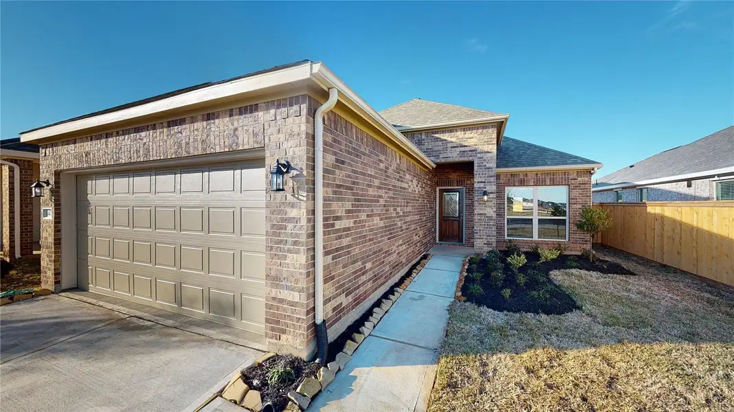 Exterior details and patio area of a home in Splendora Fields, Splendora (Image 3).