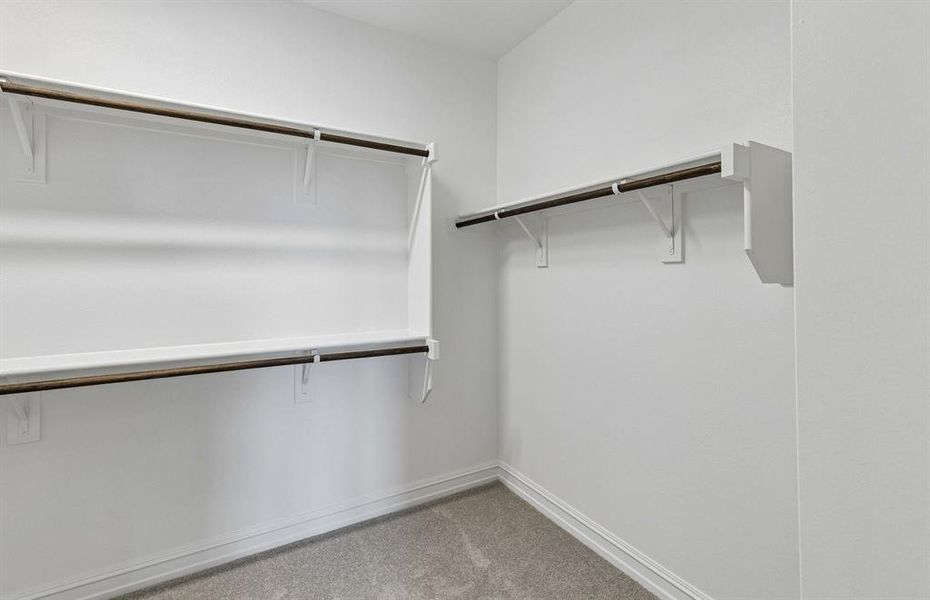 Walk in closet in primary suite