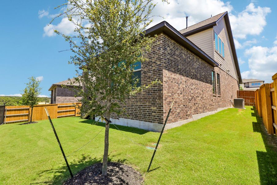 Exterior details and patio area of a home in 6 Creeks, Kyle (Image 26). Exterior details and patio area of a home in 6 Creeks, Kyle (Image 26).