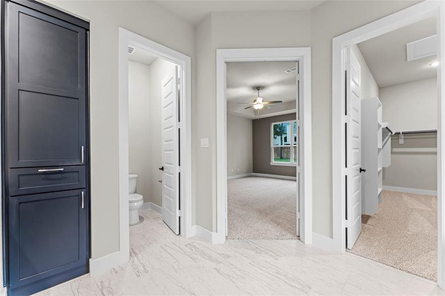 Built-in Hamper and Linen Cabinet at the Primary Bathroom too!