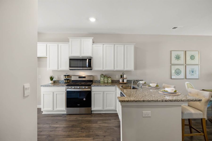 Representative furnished interior of a home built from the Calloway 3 by D.R. Horton in Byrd Village, Graniteville (Image 10).