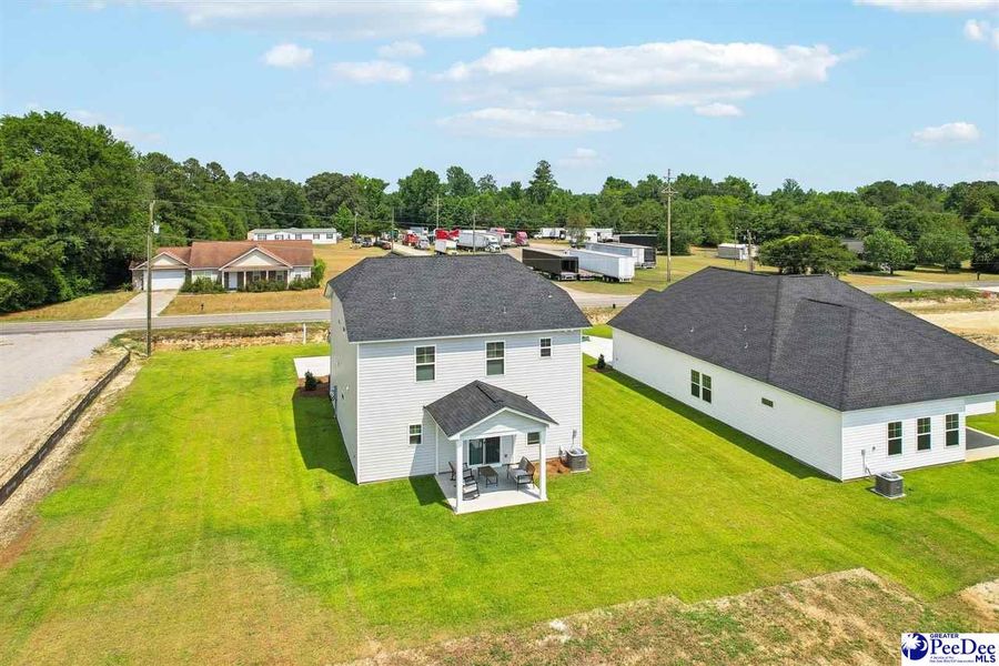Front exterior of a new home in Southern Columns, Florence, SC, highlighting curb appeal (Image 33).